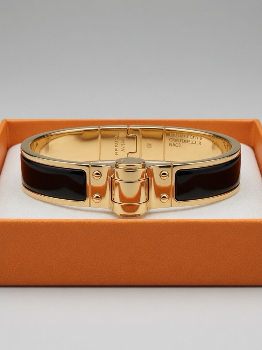 Hermes Gold and Black Clic H Bracelet
